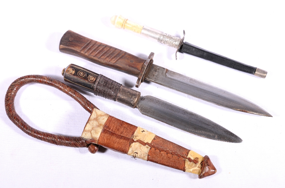 Sudanese arm dagger with wood grip in leather and snake skin bound ...