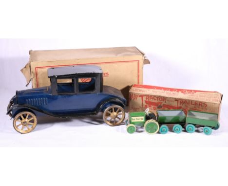 Animate Toy Baby Tractor and Trailers, boxed, the box bearing A W Gamage Ltd of Holborn, London, 2/6d price ticket, and a Day