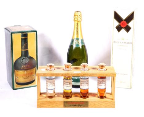 MOET AND CHANDON brut Imperial champagne, 12% vol 75cl, boxed, DEFONTAINE reserve brut champagne, 12% vol 75cl, COURVOISIER V