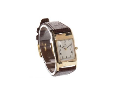 ART DECO FOURTEEN CARAT GOLD MANUAL WIND WRIST WATCHnon-Rolex generic quartz movement, the rectangular dial with Rolex and cr