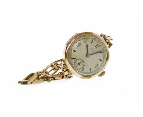 LADY'S ROLCO NINE CARAT GOLD MANUAL WIND WRIST WATCHsigned Rolco movement, the round dial with Arabic 12, 3 and 9, baton hour