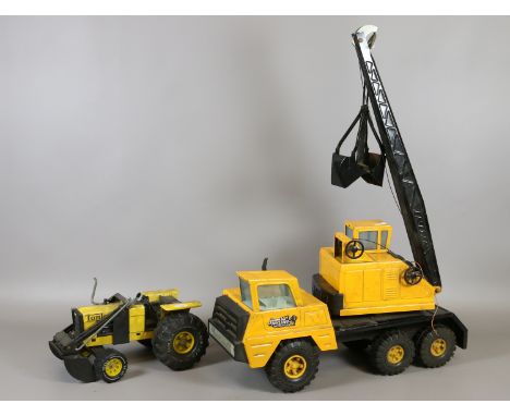 A Tonka tractor and jumbo nylint Michigan shovel crane.