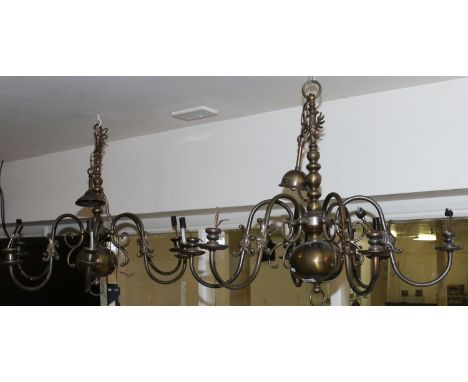A pair of antique brass six branch chandelier light fittings.