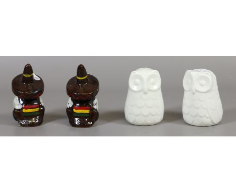 A ceramic owl and sleeping Mexican shaped salt and pepper shakers.