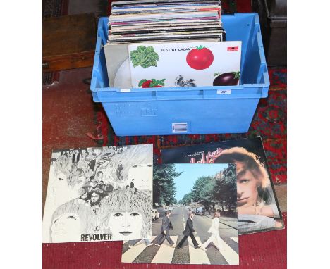 A box of L.P records to include Bowie, Cream, Beatles, T.Rex, The Who, Queen, Rod Stewart, Elvis, Pretenders etc.