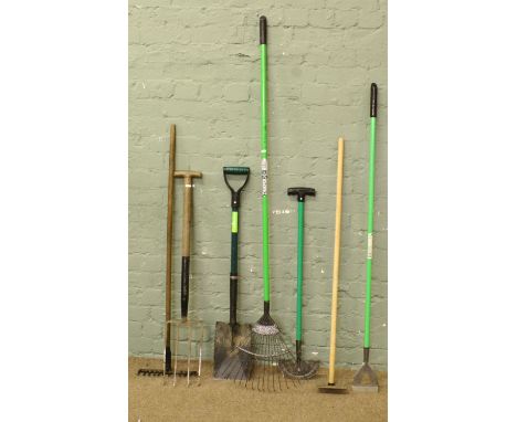 A quantity of garden tools, fork, rake etc.