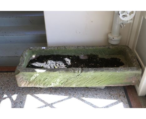 A long carved stone garden trough (AF) 125cm long.