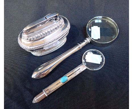 A TURQUOISE MOUNTED SILVER MAGNIFIER AND PENCIL London 1903, with another white metal magnifier and a table lighter