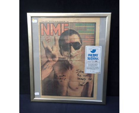 IAN DURY AND THE BLOCKHEADS: A SIGNED NME COVER 2 June 1985 signed Ian (Dury) , Chas Jankel and others, framed with a ticket 