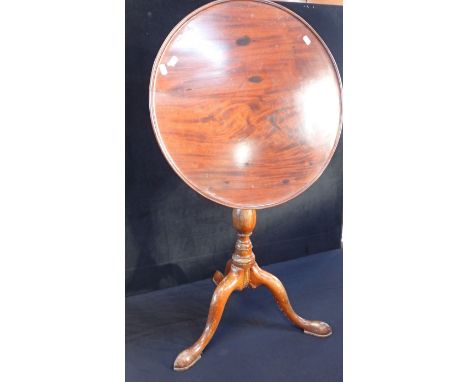 A GEORGE III TIP-TOP TRIPOD TABLE with dished mahogany top 56cm diam