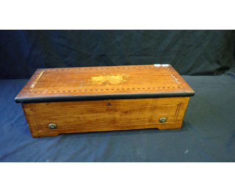 A SWISS MAHOGANY AND INLAID MUSIC BOX BY A. HAAS GENEVA playing eight airs, with air card, No. 3930, 16cm high x 51cm wide x 