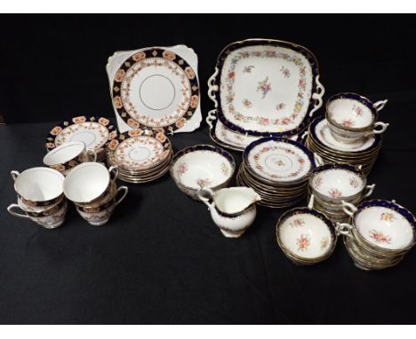 A COALPORT TEA SERVICE FOR TWELVE, WITH FLORAL DECORATION stamped for Goode and Waring and Gillows, with a Salisbury Mona bon