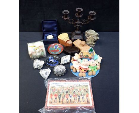 A CAST IRON CANDELABRA with other items including a soapstone carving a Staffordshire Enamels season box, a set of Disney Sev