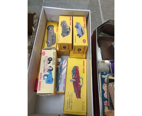 A box of boxed Dinky cars 