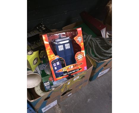 Two boxes of assorted items including toys, mantle clock, music cassettes etc 