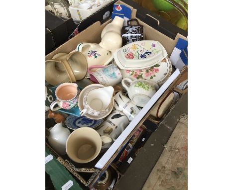 A box of mixed items including Poole 
