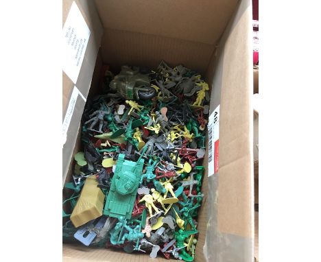A box of plastic army figures etc 