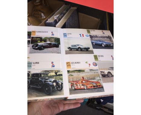 Three albums with a collection of vintage automobile photographs 
