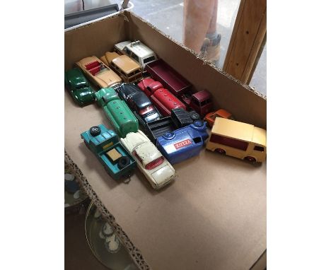 A box of toy cars, including Dinky and Corgi 