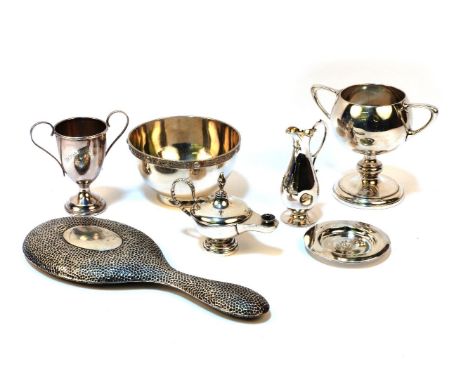 Silver items: 2 trophies, a bowl, London 1930, retailed by Harrods, a cigar lighter lamp, dressing mirror, and a Victorian tw