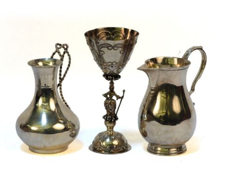 Three silver items: a baluster jug, by CS Harris and Sons, London, 1927, a Victorian jug, by Samuel Smith(?) London, 1871, an