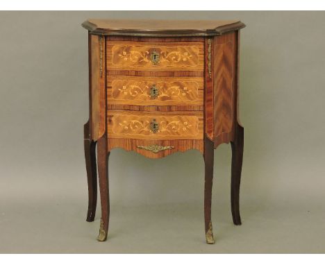 A Louis XV design Kingwood petit commode,the shaped top above three drawers, on cabriole supports46cm wide30cm deep70cm high