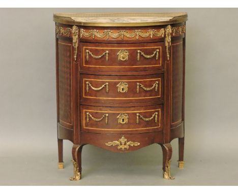 A Louis XV style parquetry and gilt metal mounted demi lune commode chest of three drawers, with marble top, 70cm wide, 36cm 