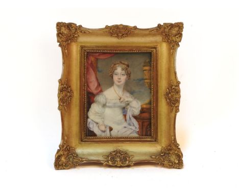 A miniature portrait of a seated lady wearing a white dress, in gilt frame, 10.5 x 8.5cm