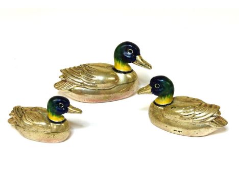 Three sterling silver graduated ducks with polychrome enamel painted heads, and receipt, dated 1997