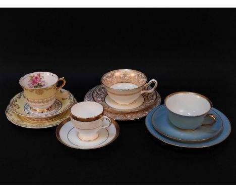 A Wedgwood tea service, with gilt detailing, a German turquoise glazed tea service, and one other (qty)