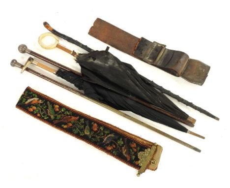 Two mounted walking canes, one hallmarked, a hedgerow stick, and two parasols, with horn or ivory terminals, early 20th centu