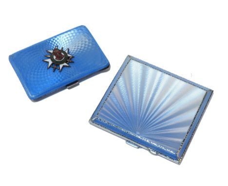 Two silver and enamel cigarette cases, one with blue radiating pattern, the other Russian, with crest and cyrillic script