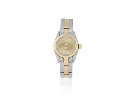 Rolex. A lady's stainless steel and gold diamond set automatic bracelet watchModel: Oyster PerpetualReference: 67193 (rubbed)