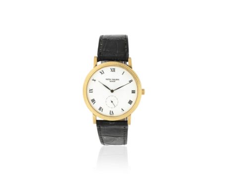 Patek Philippe. An 18K gold manual wind wristwatchModel: CalatravaReference: 3919Date: Manufactured 1999, Purchased 20th June