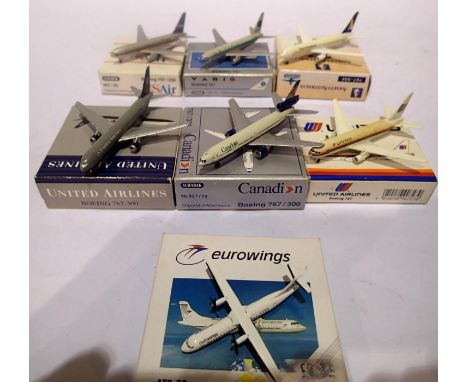 Six Schabak 1:600 scale model aircraft and Herpa 1:500 scale ATR 72 Eurowings, ex display, requires cleaning. P&amp;P Group 1