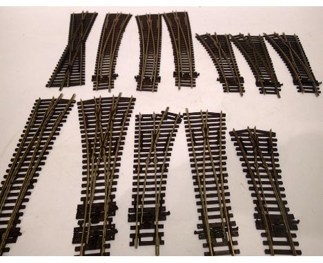 Nine Peco points and three Hornby points, all good used condition. P&amp;P Group 1 (£14+VAT for the first lot and £1+VAT for 