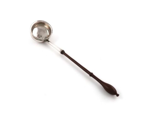 A George II silver punch ladle, maker's mark possibly JA, London 1735, circular bowl, tapering socket, turned wooden baluster