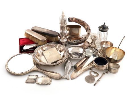 A mixed lot of silver items, various dates and makers, comprising: a sugar caster, London 1973, a salt cellar, a pepper pot, 