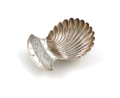 A George III silver caddy spoon, by Hester Bateman, London 1784, shell bowl, the spread handle with bright-cut decoration, le