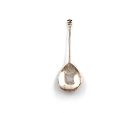 An Elizabeth I silver Seal-top spoon, maker's mark of a device, partially obscured, London 1578, faceted stem, the finial wit