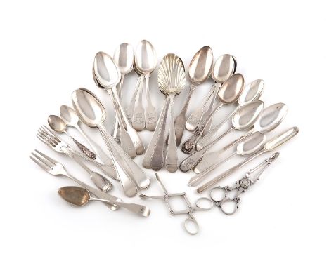 A collection of silver flatware, various dates and makers, comprising: eight tablespoons, eight dessert spoons, a Dog-nose sp