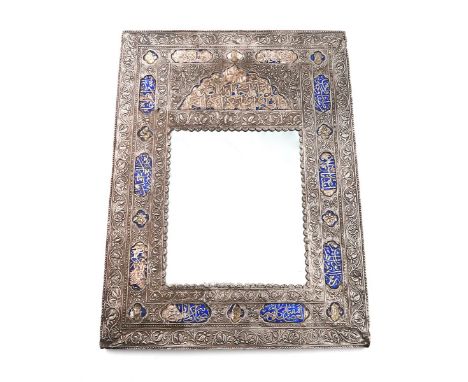 A Persian silver and enamel mirror, rectangular form, with panels of script on a blue enamel ground, and with gilded heads an