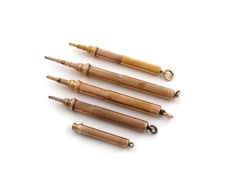 A collection of five gold and gilt-metal single extension propelling pencils, including: a 9 carat gold one retailed by Aspre