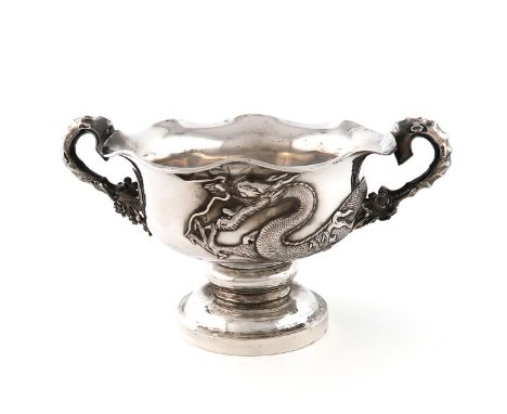 A Chinese silver two-handled bowl, marked WA twice, and with Chinese characters, circular form, wavy-edge border, the body ap