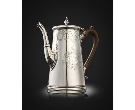 A George II Irish silver coffee pot, by Charles Leslie, Dublin circa 1740, tapering circular form, chased foliate shell and s