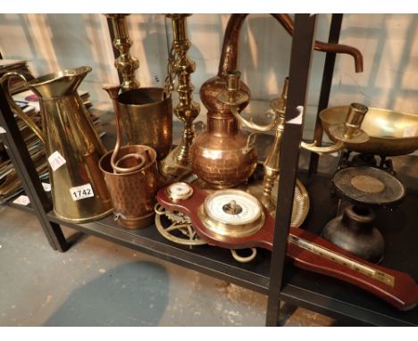 Shelf of mixed brass and copper including candlesticks jugs trays etc