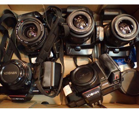 Minolta autofocus bodies comprising two Minolta Dynax 300si two 5000 autofocus one Dynax 3000i with four Minolta lenses two 3
