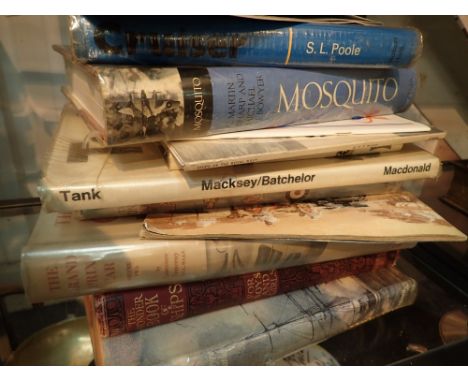 Shelf of mixed aircraft and military related books