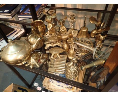 Shelf of mixed brassware