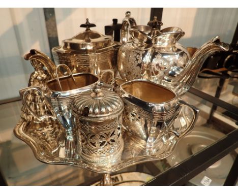 Shelf of mixed silver plate including tea set